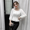Virginia – Blusa off shoulder elegante con volantes