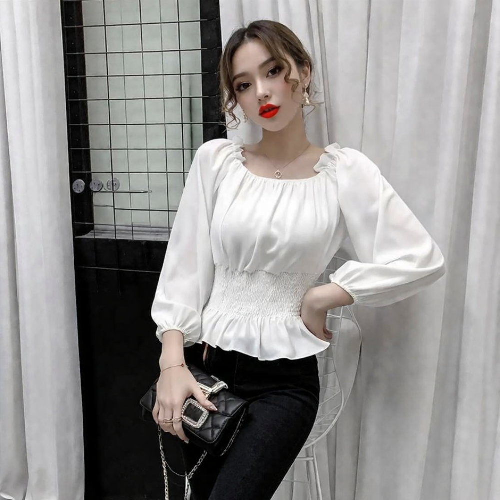Virginia – Blusa off shoulder elegante con volantes