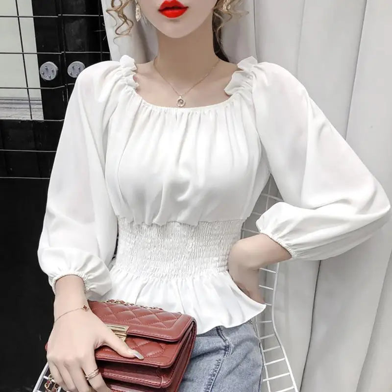 Virginia – Blusa off shoulder elegante con volantes