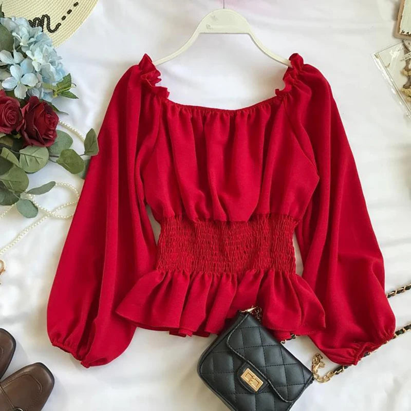 Virginia – Blusa off shoulder elegante con volantes